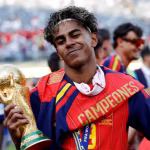Lamine-Yamal-of-Spain-celebrates-the-World-Cup-victory-with-the-trophy-on-July-19-2026